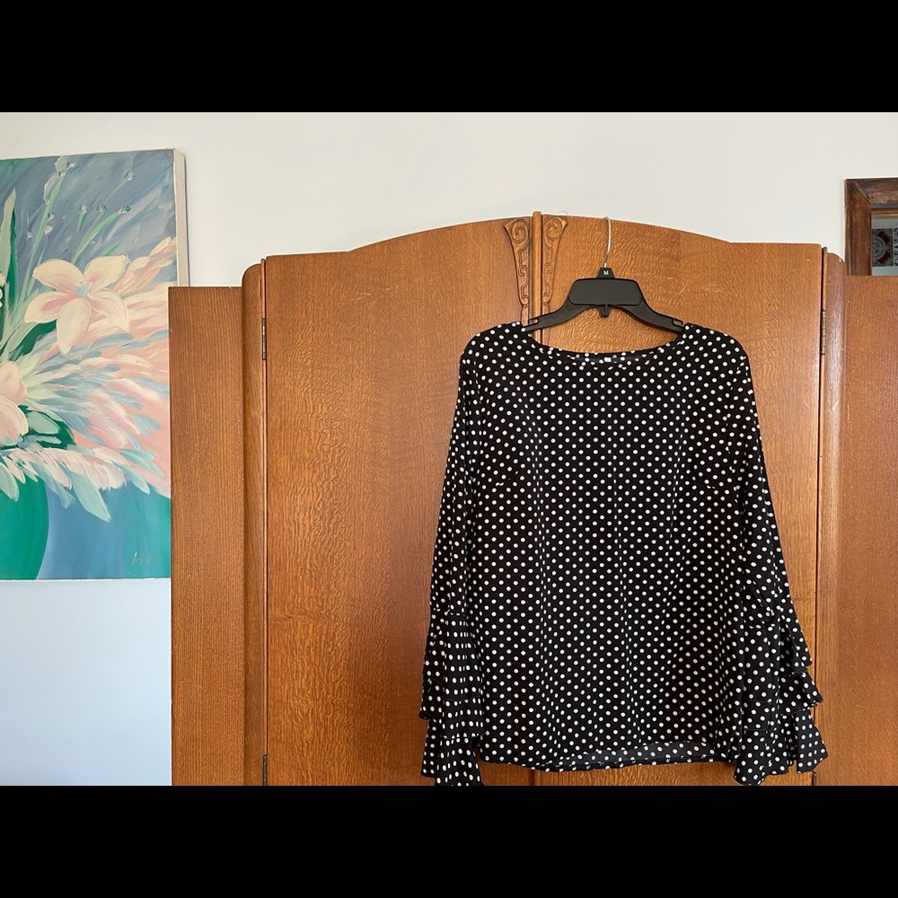 Lovely polka dot blouse.